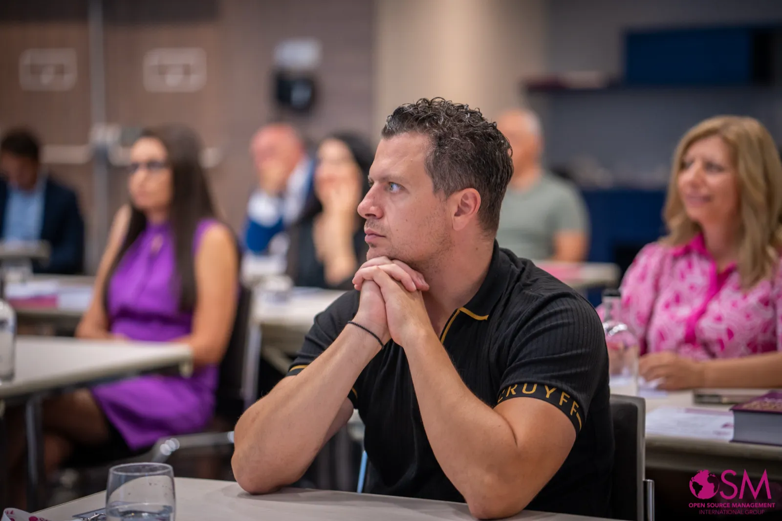 An entrepreneur listening during an OSM session